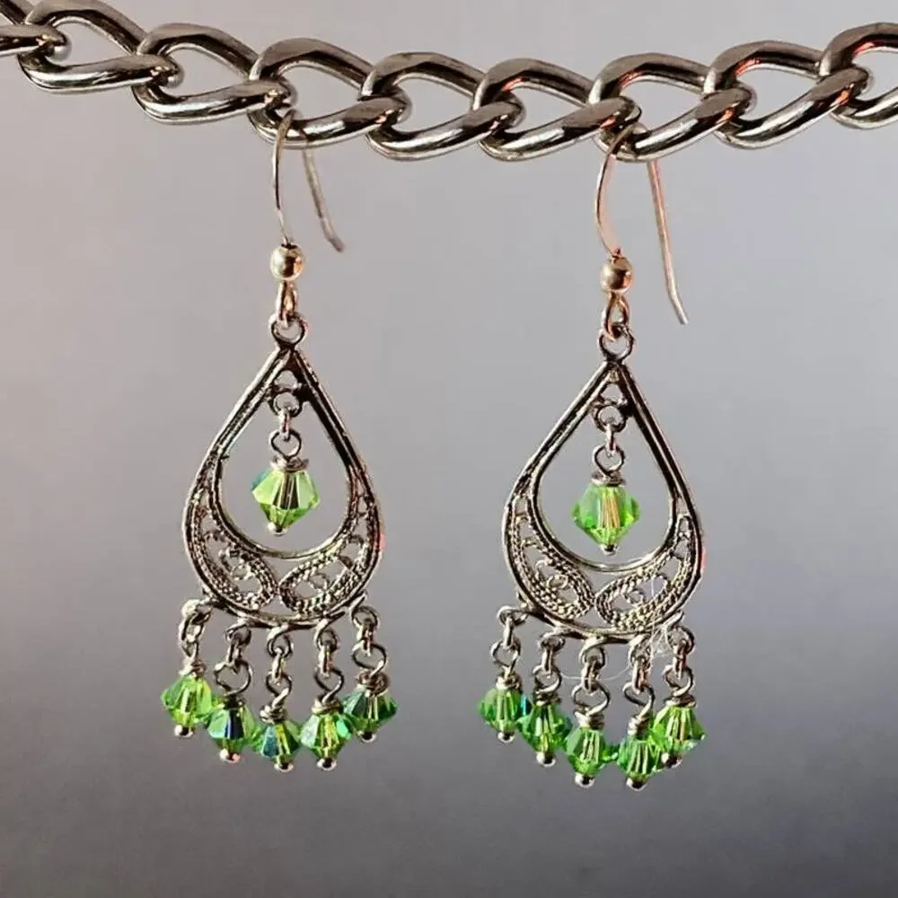 Delicate silver tone and leaf green chandelier earrings